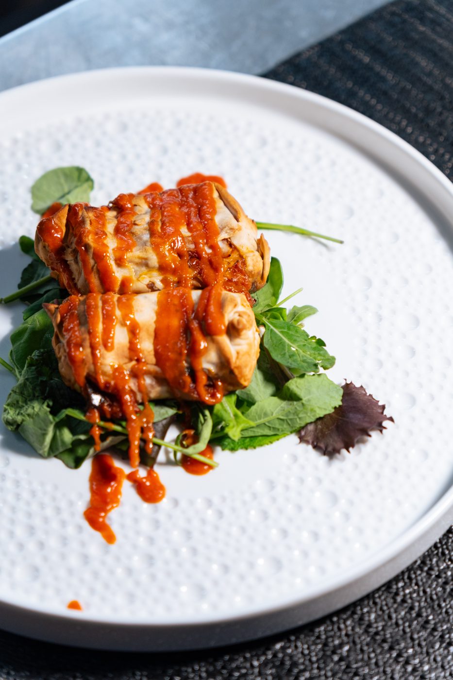 Piatto gourmet servito a Terrazza Oliva